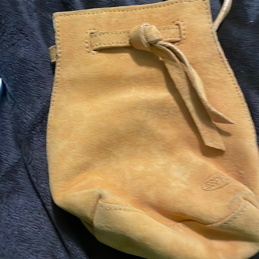 Mustard yellow espirit  small purse. Excellent condition.